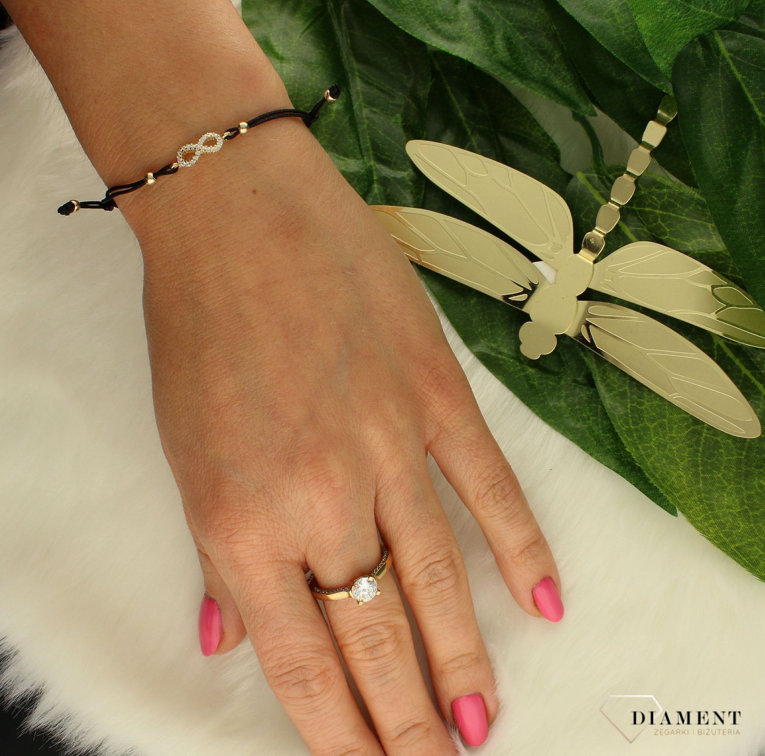 Bransoletka damska na sznureczku ze złotymi kuleczkami i znakiem nieskończoność  BR 2077A 585. Nieskończoność, to częsty motyw biżuteryjny dla nastolatek i młodych kobiet, które stawiają na efektowne dodatki. Idealna bransole.jpg